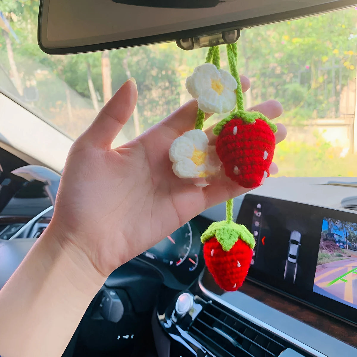 Handmade woven strawberry pendant decoration for car or keychain with lily of the valley hook.