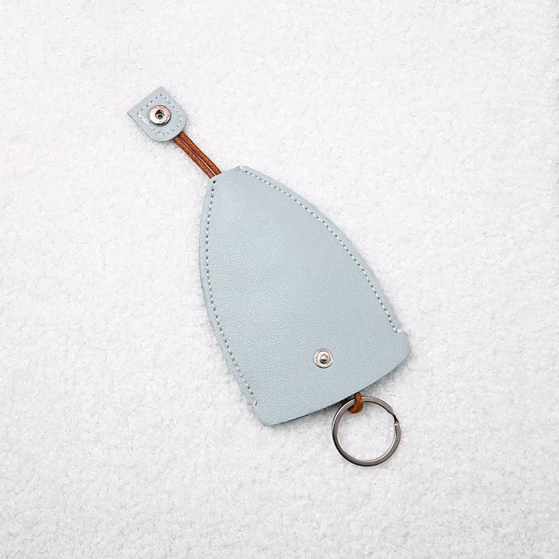 Cartoon PU leather pull-out car key case measuring 14 x 7.5cm with colourful designs