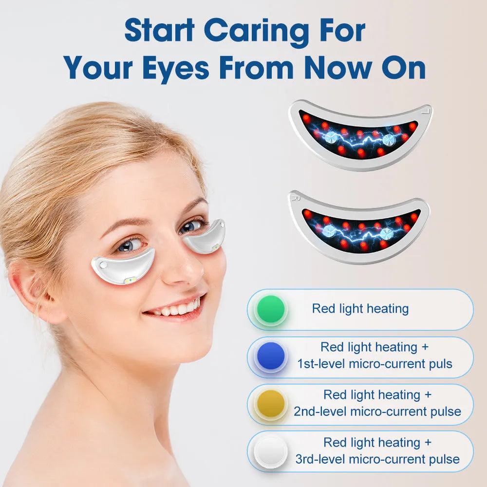 White wireless red light EMS eye and face two-in-one massage device on a table.