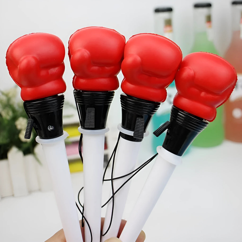 Four boxing press ejection pens showing push-button fidget mechanism and 0.7mm writing tips