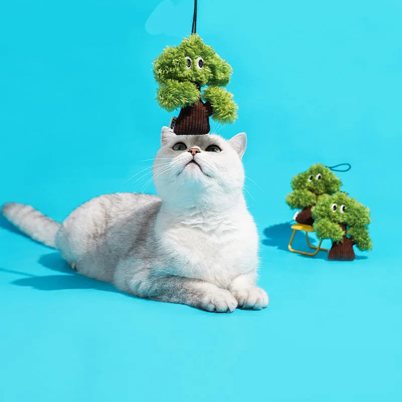Pine tree-shaped cat toy pendant bag with mint filling for biting and grinding, shown in three size options.