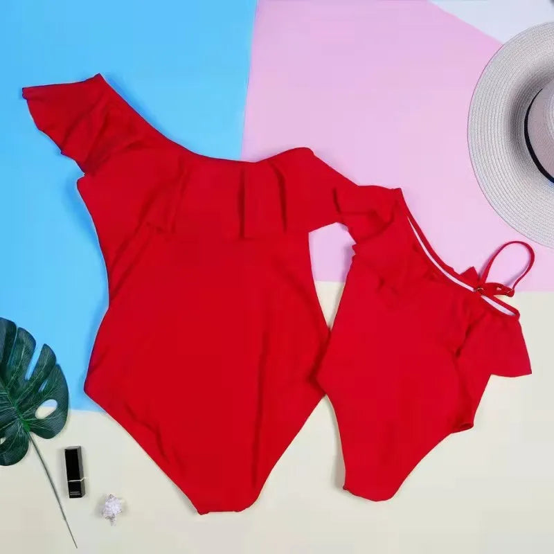 Parent and child matching swimsuit set in red, blue, green, and black for mum, dad, girls, boys, and babies up to 2XL