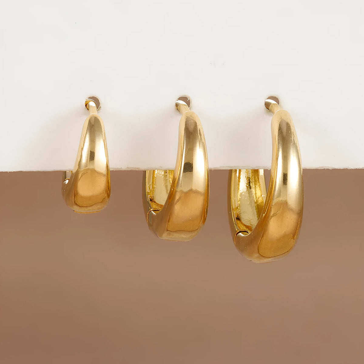 Geometric copper earrings 3-piece set in gold tone with electroplated glossy finish and round design