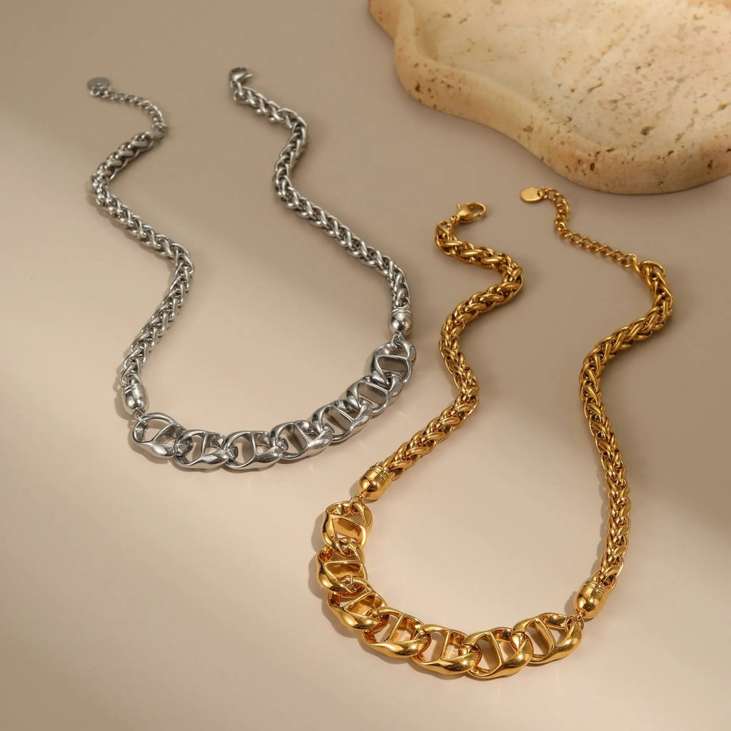 Gold plated stainless steel geometric pendant necklace for women on a chain.