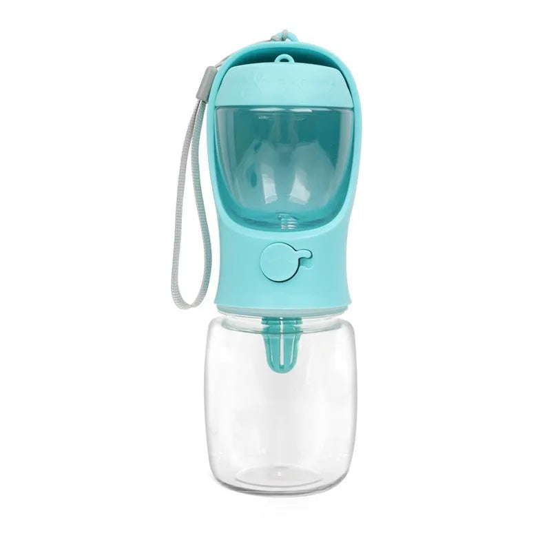 Blue portable plastic dog water bottle with integrated drinking trough for outings.
