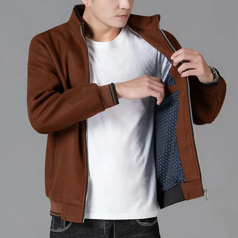 Men's grey sports-style fleece jacket with long sleeves and a stick pocket