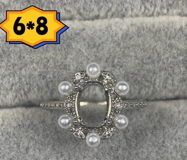 Oval denier ring with open mouth design, five-pointed star ornament, and 6*8mm stone