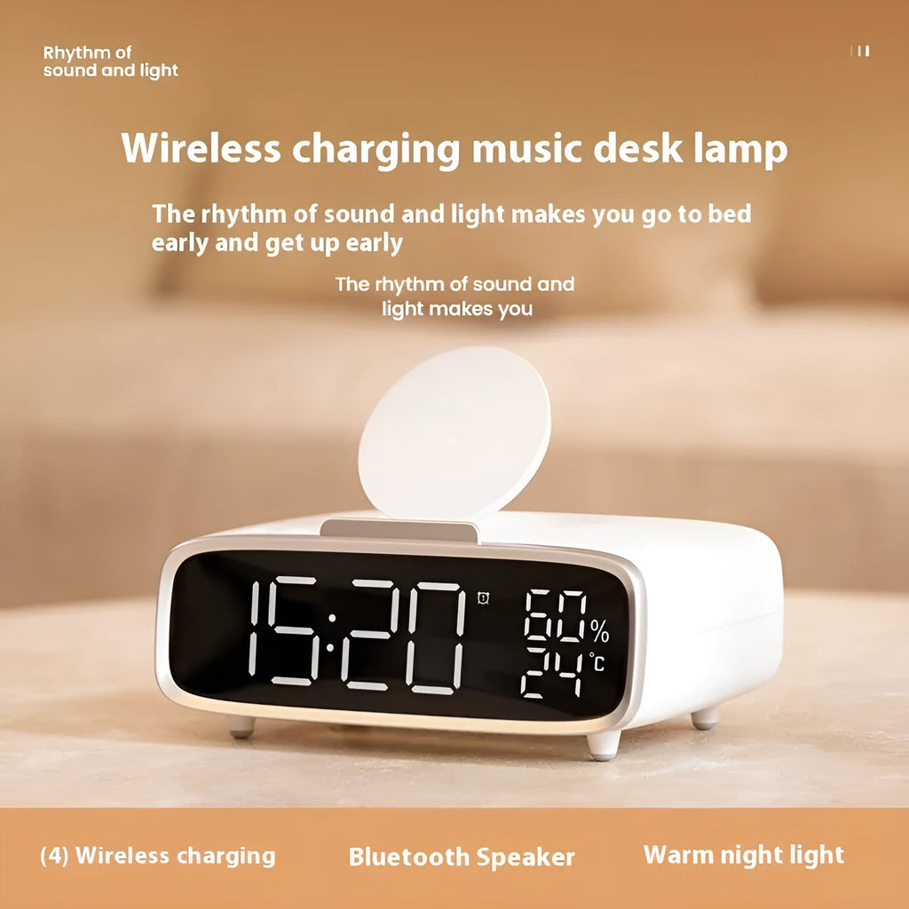 White compact Bluetooth speaker with integrated wireless charging pad and night light on a table