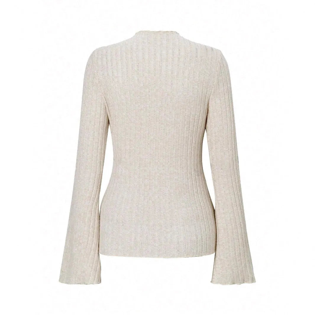 Long sleeve slim fit polyester top with lantern sleeves in black colour, showing round neck design