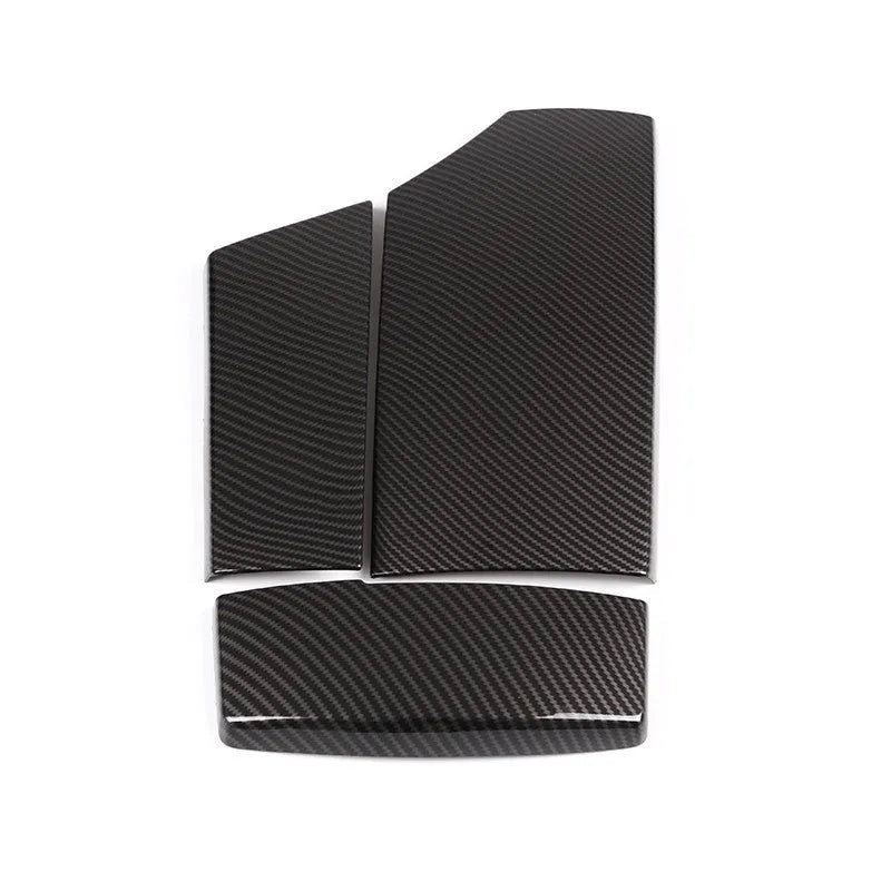 Set of three glossy black carbon fibre pattern ABS protective covers for a car armrest box.