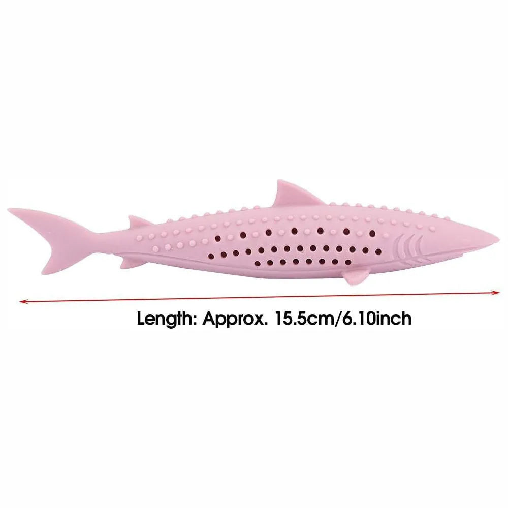 Green silicone fish-shaped chew toy for cats with breathable side holes on a white background.