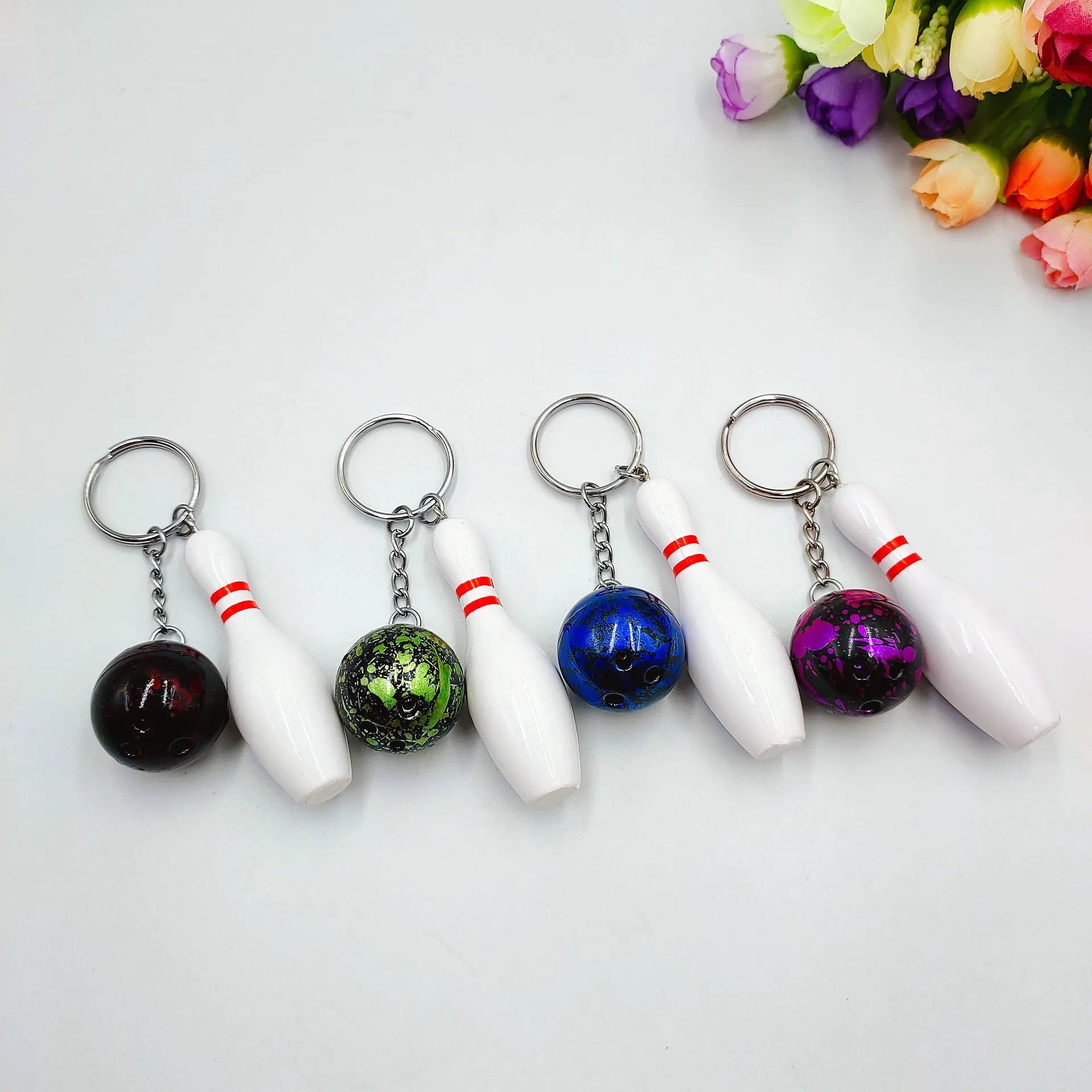 Mini bowling sports simulation keychain pendant in PVC metal showing colour options