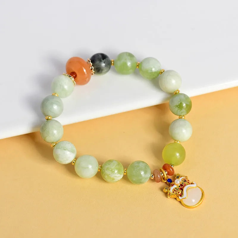 Green milk-in-water jade bracelet with 10mm geometric pendant in retro Xingshi design