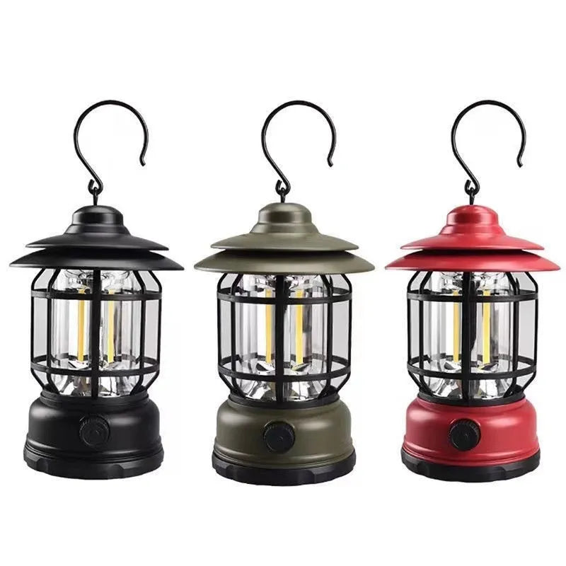 Portable dark green head lamp camping lantern shown on a table with super bright LED light on.