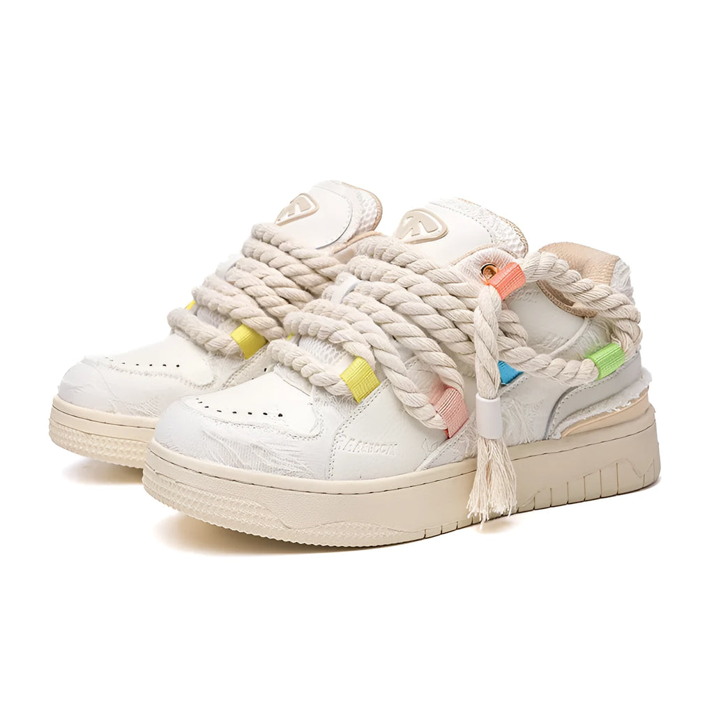 Creamy white old damage lace-up retro skateboard shoes with low-top round toe and platform sole.