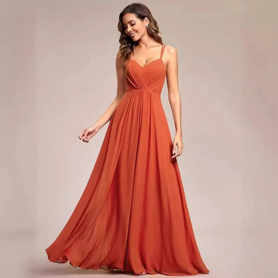 Women's light green sleeveless sling dress with pleated long A-line skirt