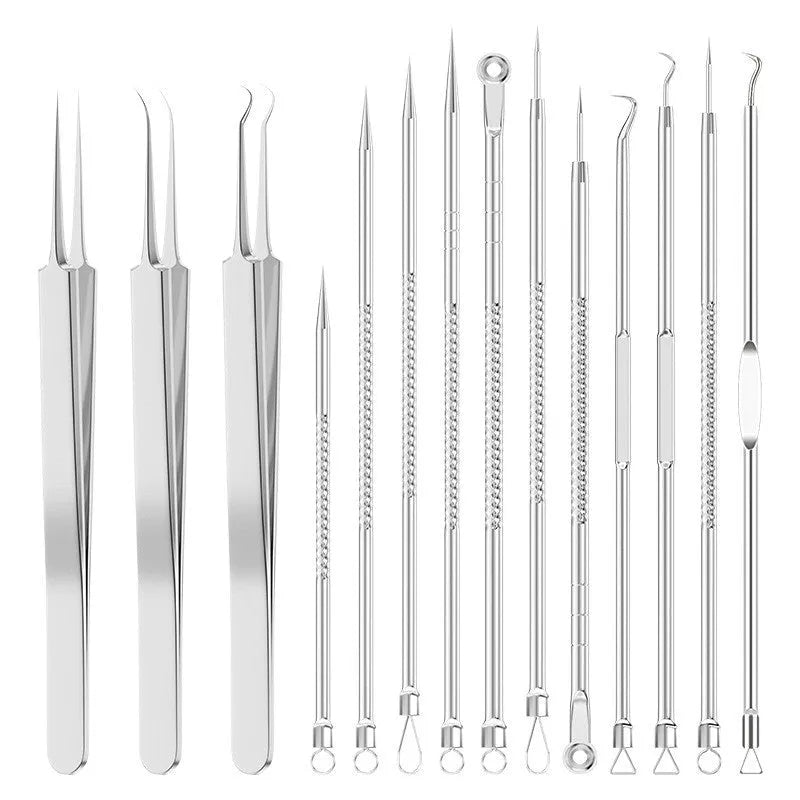Four silver metal acne needles with fine points held together by a metal clip.