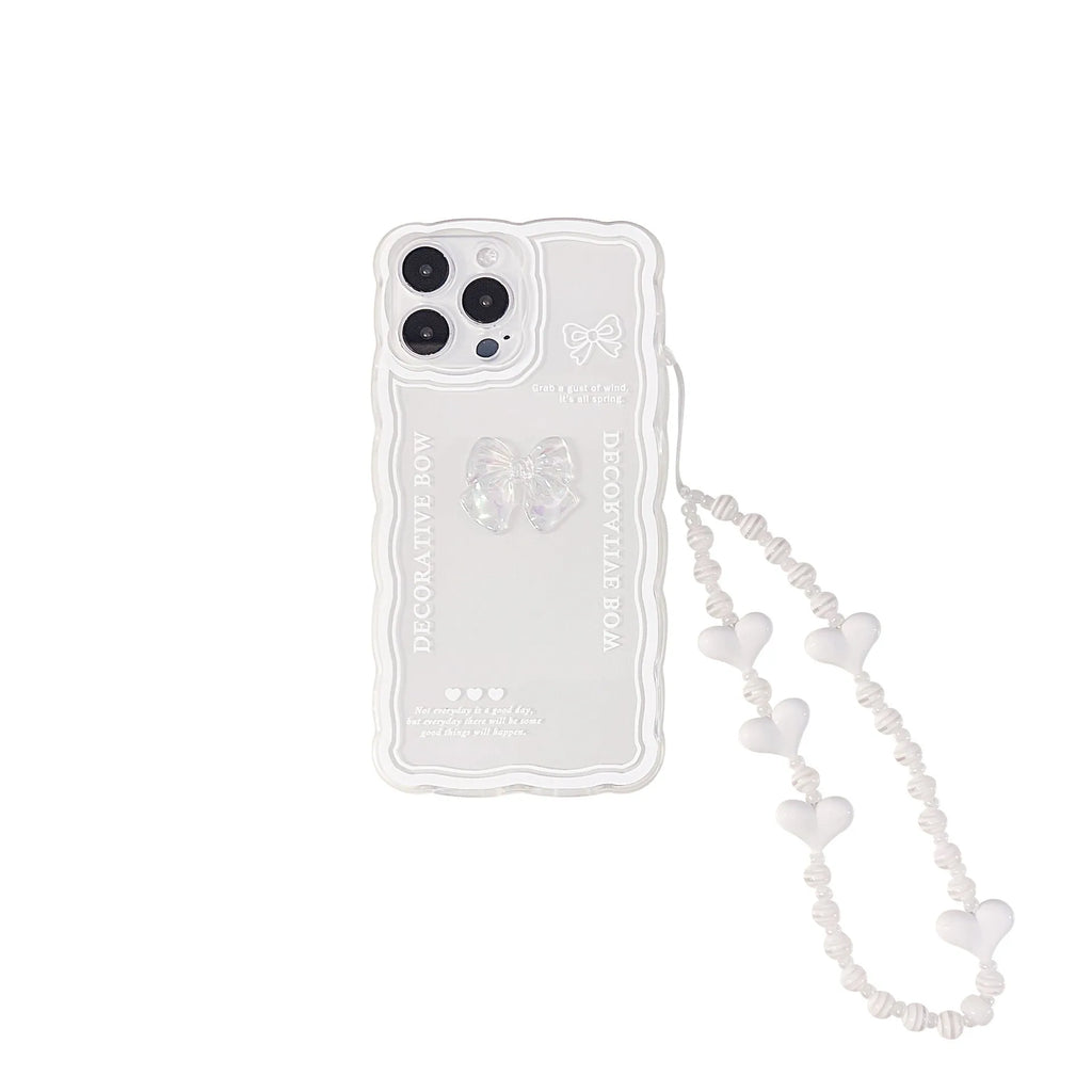 Transparent iPhone case with three-dimensional bow decoration and white love lanyard attached