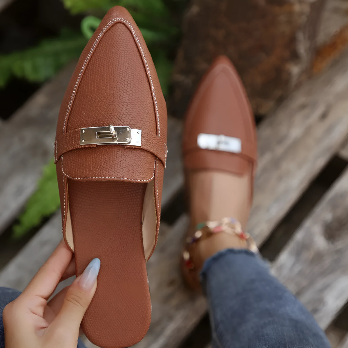Light brown women's pointed-toe low heel semi-slippers with a PU upper and rubber sole.