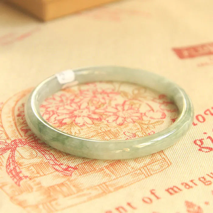 Green jade waxy geometric bracelet with 10mm width and Chinese style design