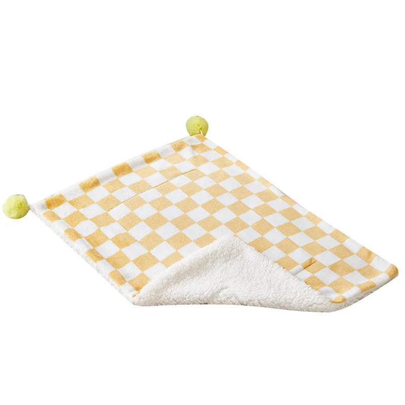 Plaid pattern pet blanket with fur ball decoration in green, pink, or yellow colours