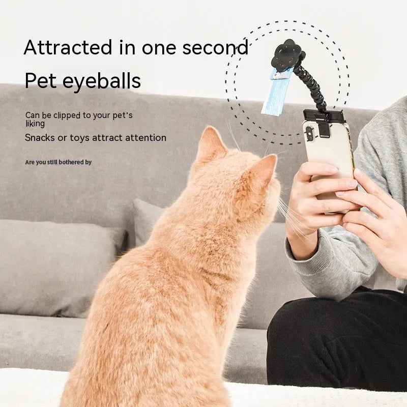 Black plastic pet photography tool with rotating clip for mobile phone attachment