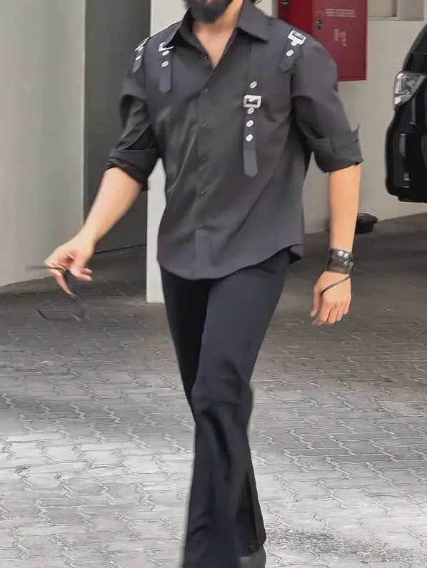 Men's black utility-style button-up shirt made from polyester fabric on a hanger