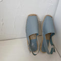 Women's beige retro flat sandals with canvas upper and animal pattern