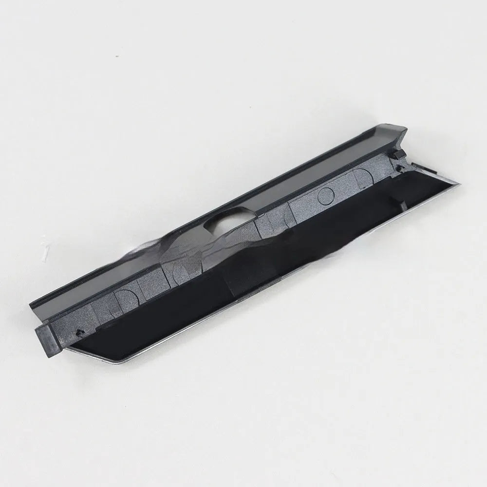 A black plastic hard drive baffle bin cover for a 3.5-inch PC case bay.