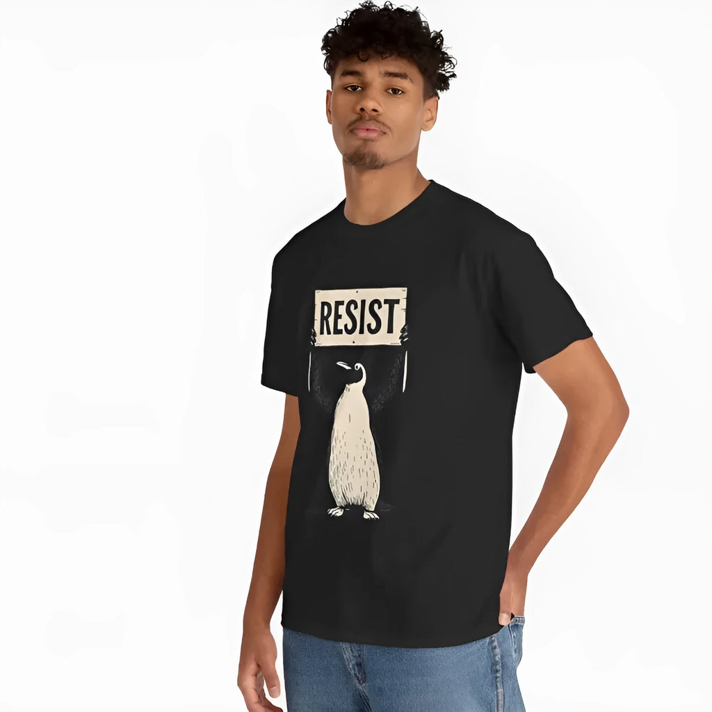 A loose-fit black cotton t-shirt with short sleeves and a round neck on a hanger.