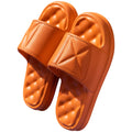 Pair of soft EVA bathroom sandals with a textured non-slip sole, shown in a choice of colours.