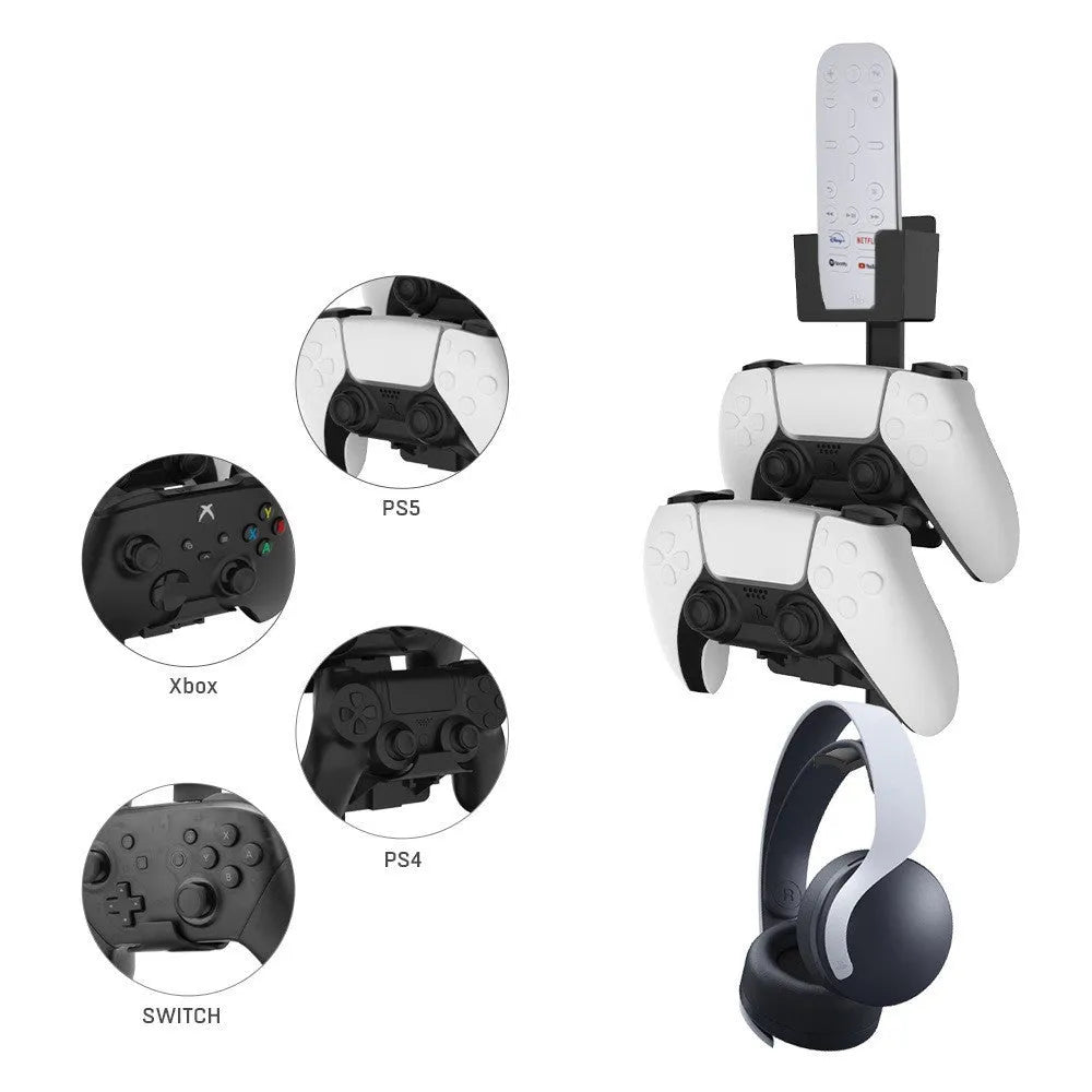 White ABS plastic wall hook holding a black game controller.