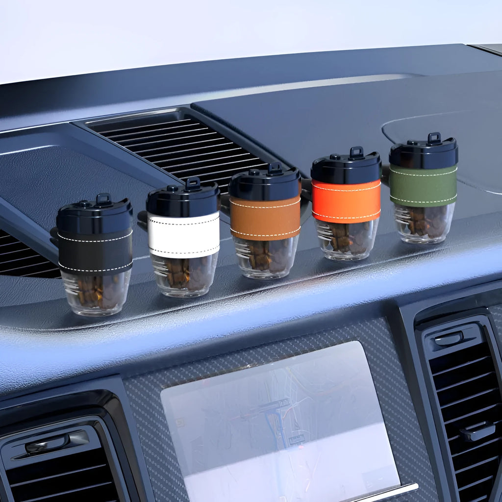 Coffee cup shaped car air freshener solid fragrance in plastic housing with decorative design