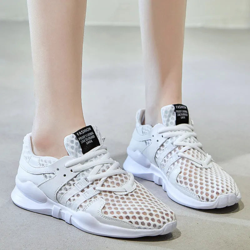 Men's black mesh casual sneakers with hollow breathable design and low-top cut