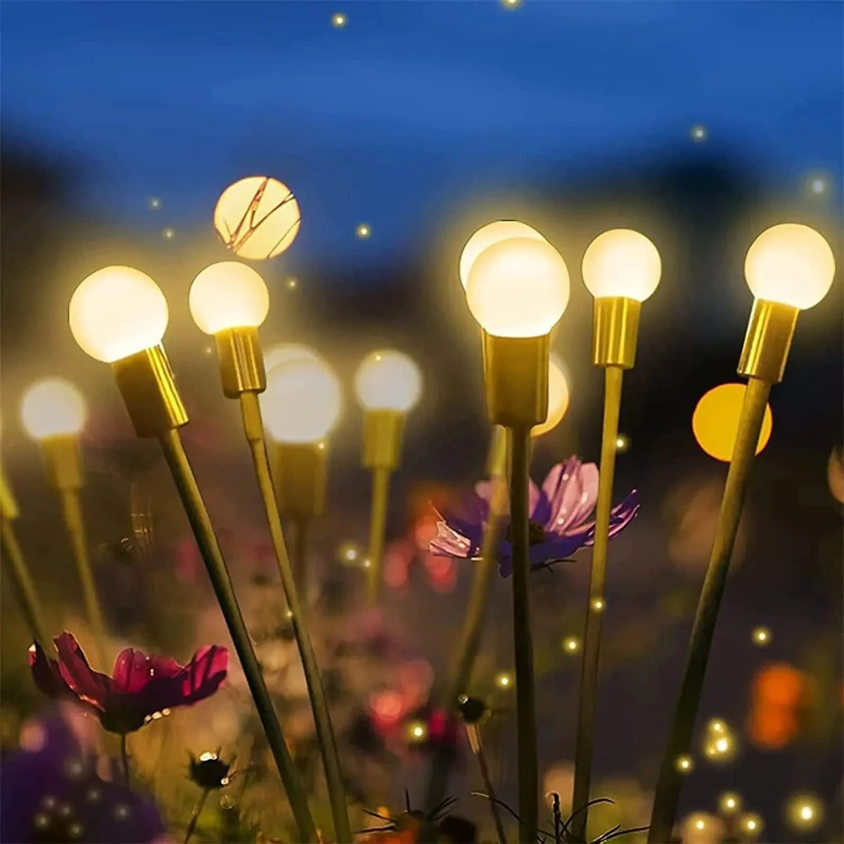 Solar LED firefly garden light with ground spike in warm white or coloured light options