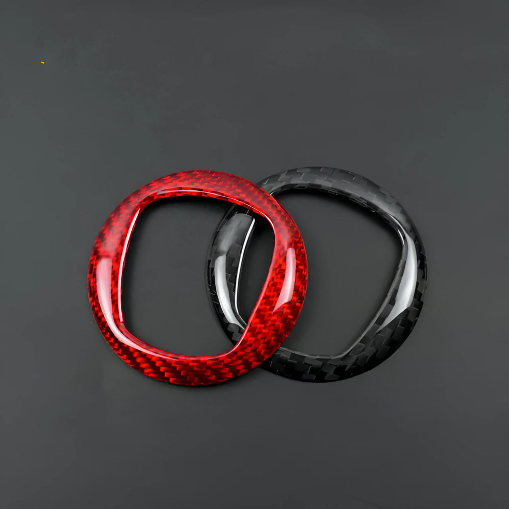 Carbon fibre steering wheel cover in black and red colour options showing textured carbon pattern