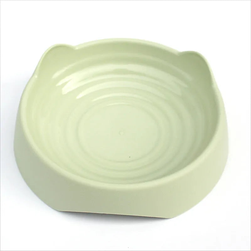 Ceramic dog slow feeder bowl in pink colour showing maze pattern with raised ridges