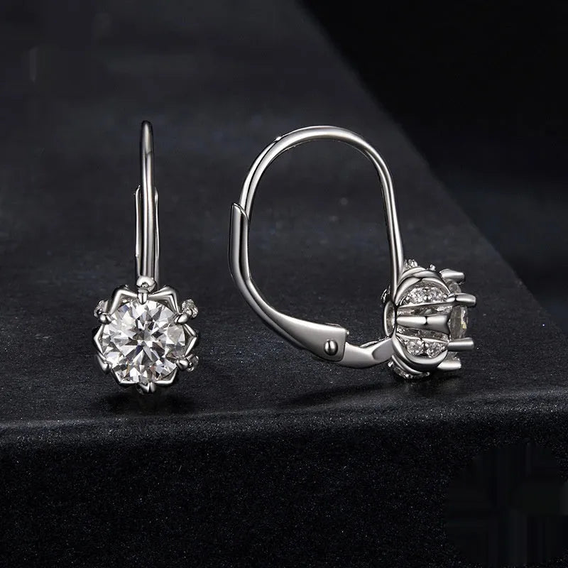 Flower bud design clip earrings in sterling silver with moissanite stone and white gold plating