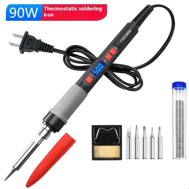 Grey 90W electric soldering iron with ceramic heating core, UK/US plug, sponge, holder, and five tips.