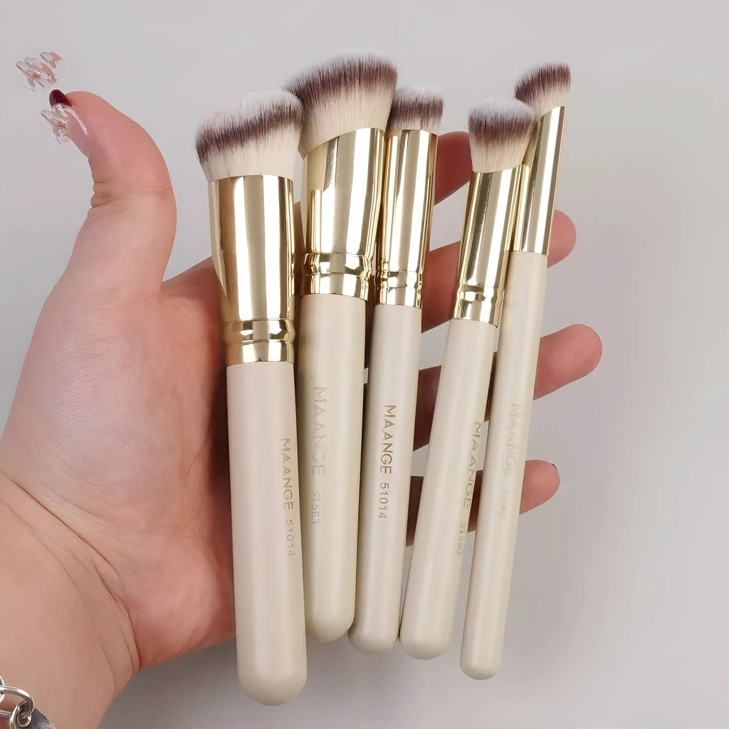 MAANGE apricot coloured 5-piece makeup brush set with angled blusher brush on a table
