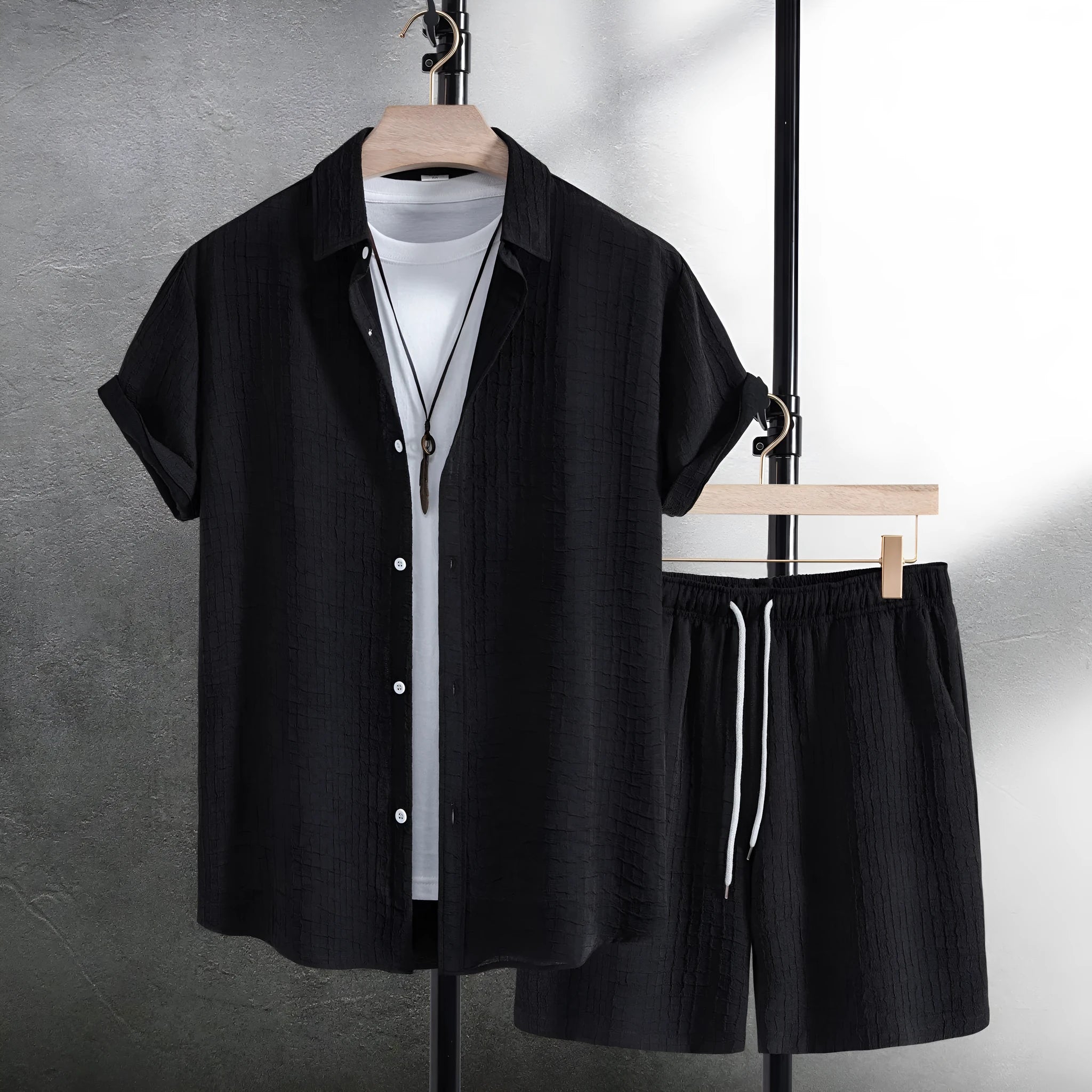 Men wearing black cotton blend jacard short sleeve shirt and matching shorts casual two piece suit