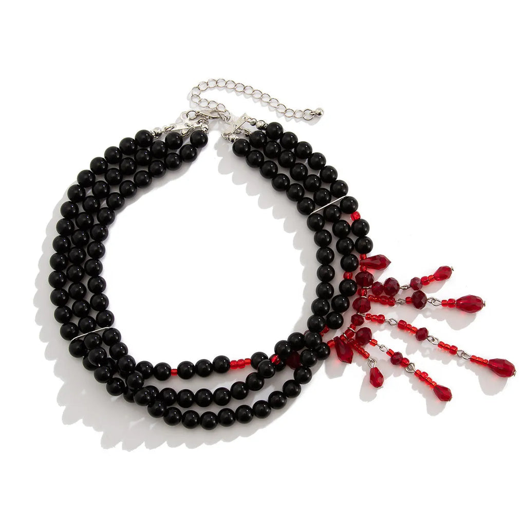 Men's Halloween blood drop tassel necklace with geometric crystal pendant and pearl elements on regular chain
