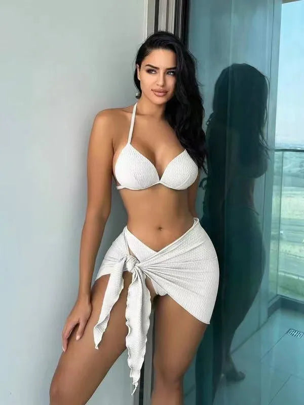 Women's black three-piece Russian split swimsuit set with a skirt on a mannequin