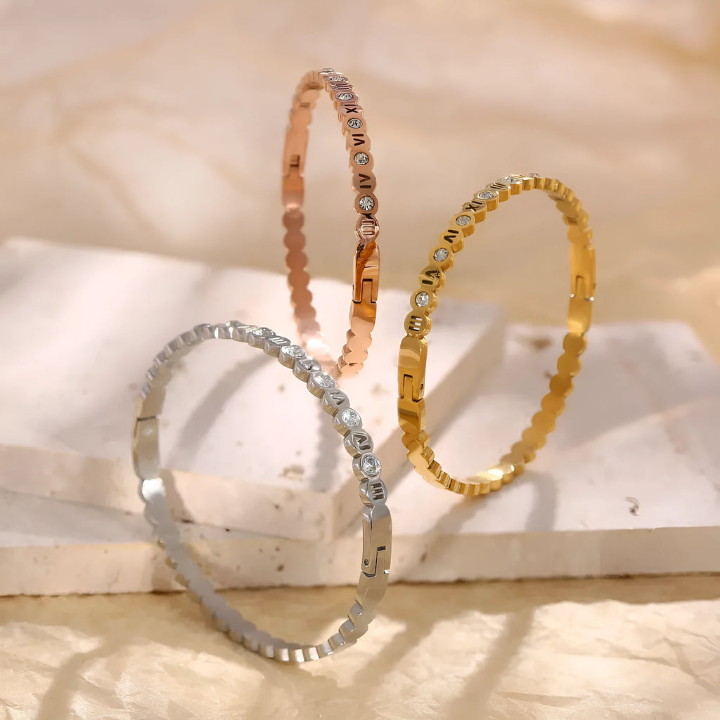 Korean style titanium steel bracelet with number elements in gold, rose gold, or steel colour options
