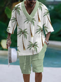 Man wearing a loose-fitting short-sleeve top and matching casual shorts in a solid colour.