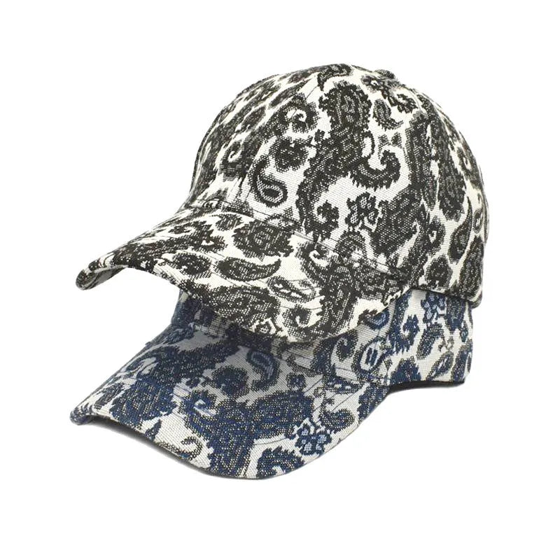 Polyester baseball cap with paisley pattern print in blue, black or wine red colours showing dome crown design