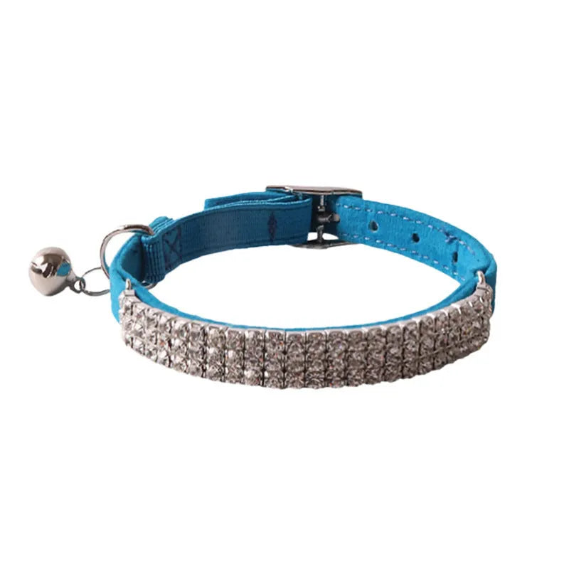 Flocking material cat collar with elastic buckle and gang drill pattern in multiple colours.