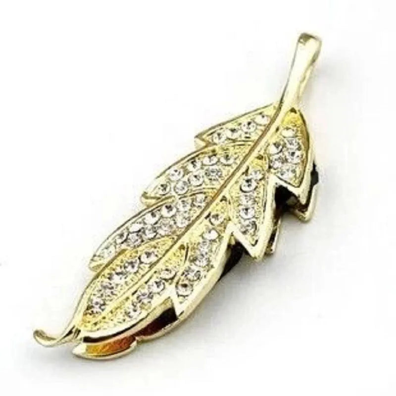 Silver metal USB flash drive shaped like a crystal maple leaf on a keyring.