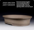 Handmade antique oval bonsai flower pot in purple sand clay, showing dimensions.