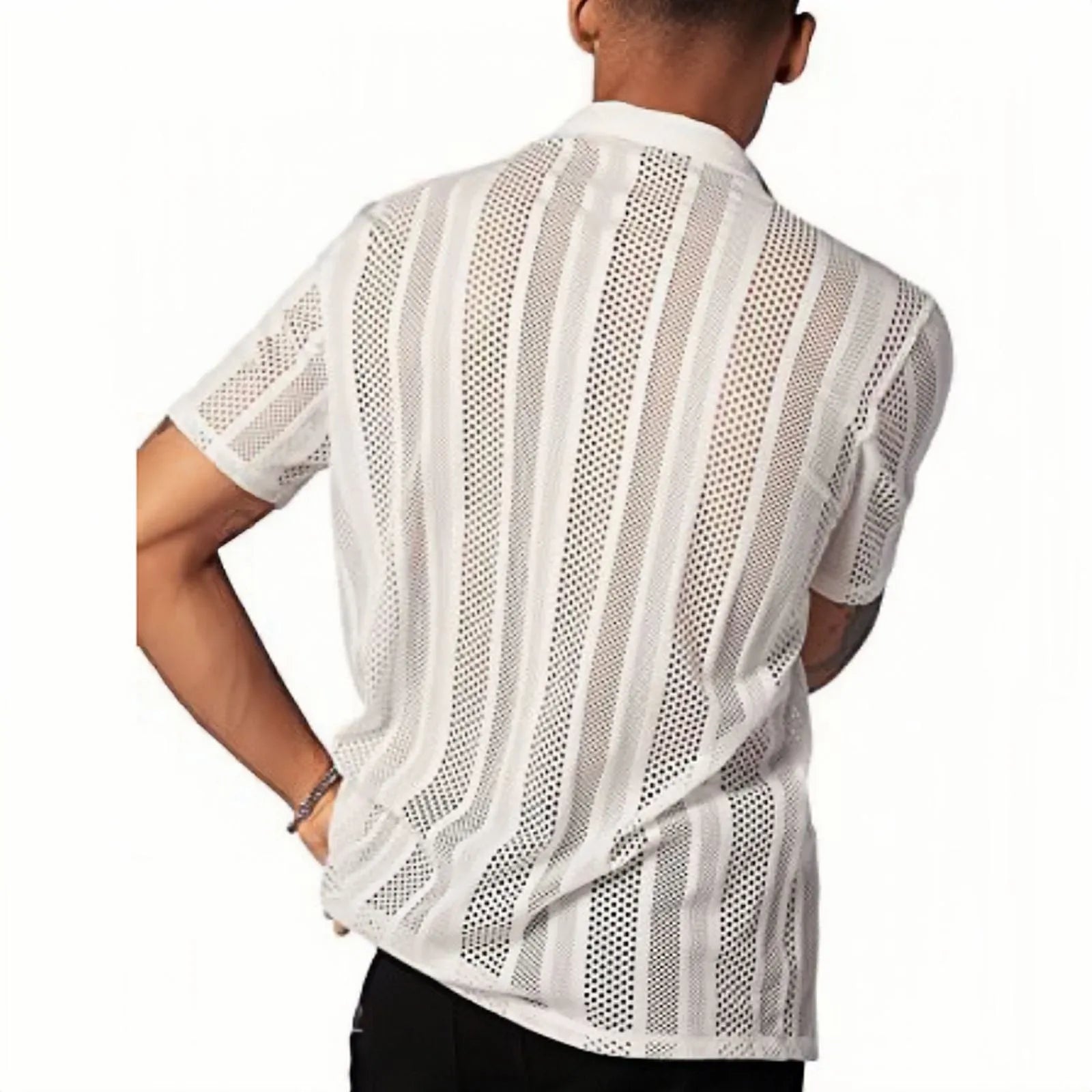 Man wearing a black jacquard knitted short-sleeve button shirt in a cardigan style